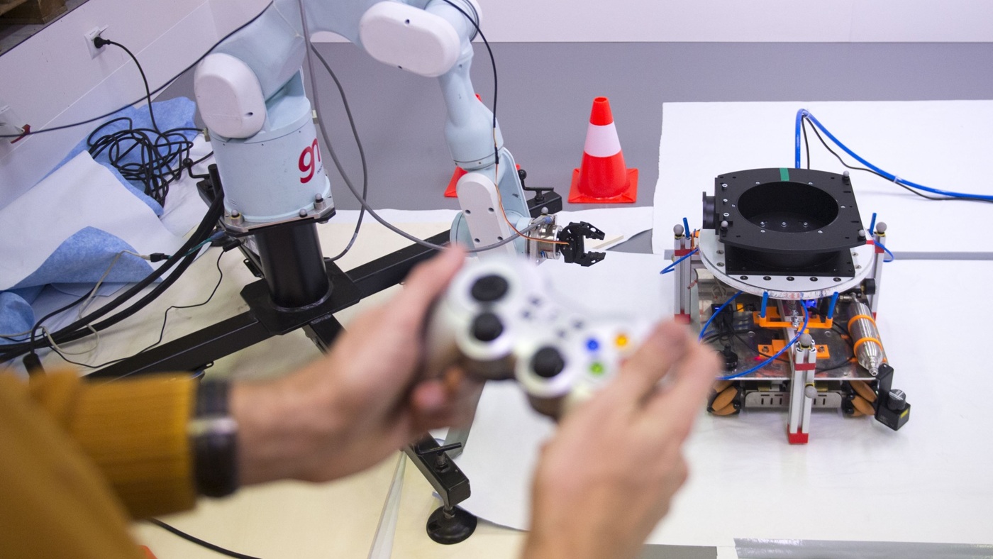 ESA robotic-arm control demonstration. Context for evaluating robot learning, not an experiment from the framework discussed here.