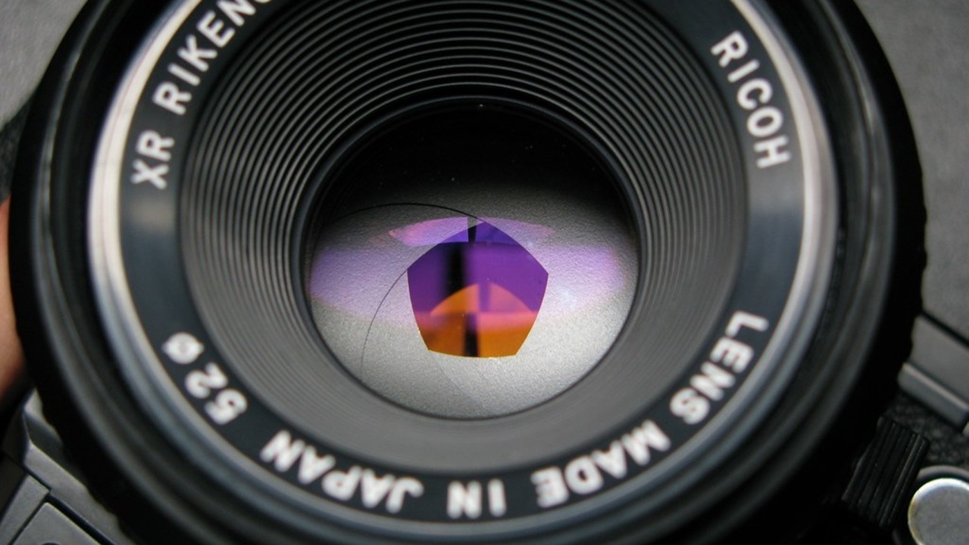 A camera lens and aperture. Context photograph for visual recognition and contrasting examples.